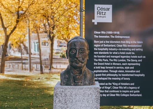 César Ritz statue in front of Brig campus