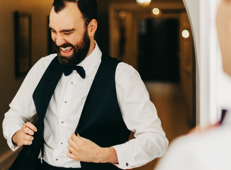 A waiter getting ready to dance through the dining room